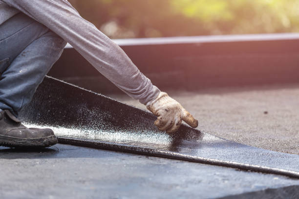 Professional Basement Waterproofing technician working in Reisterstown, MD